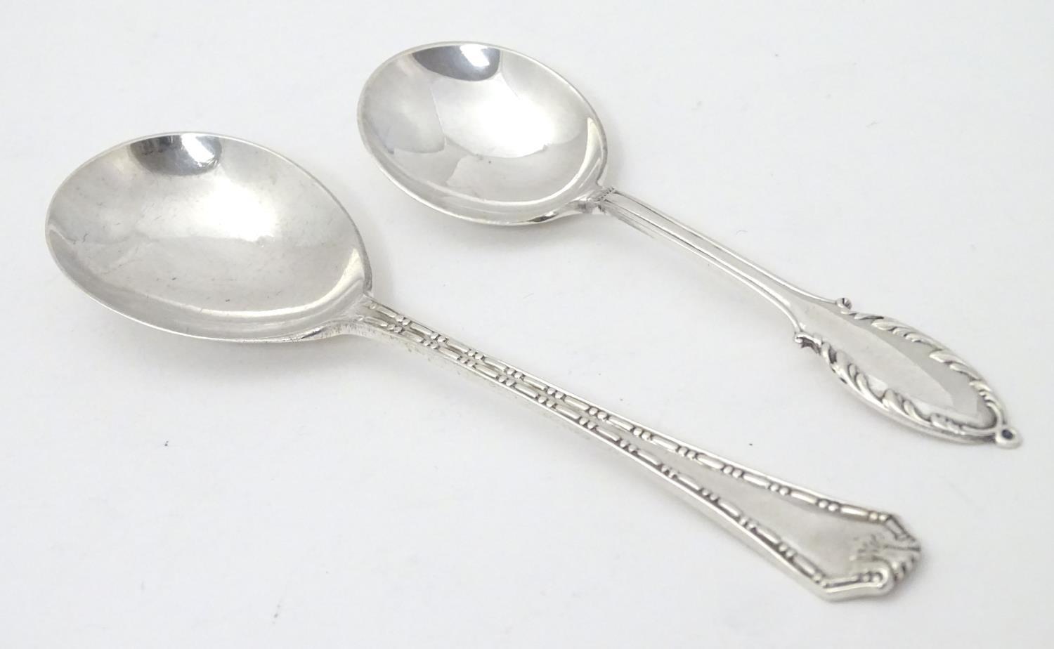 Two silver jam / preserve spoons one hallmarked London 1928 maker Deakin & Francis, the other