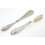 American sterling silver handled shoe horn and brush. Both with maker?s mark for Watson Co. of