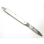 A silver handled folding fruit knife, hallmarked Birmingham 1928, maker Cohen & Charles. 3" long (