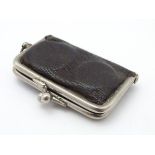 A late 19thC / early 20thC full and half sovereign case formed as a small leather purse with a clasp