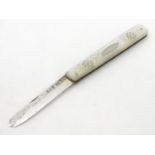 A Victorian silver folding fruit knife with mother of pearl handle having engraved decoration.