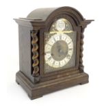 Clock: an early to mid 20thC Junghans 3 train Westminster Mantle clock, the oak case with barley