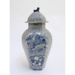 A blue and white hexagonal lidded ginger jar by W. M. Adams, in the pattern Chinese Bird, with