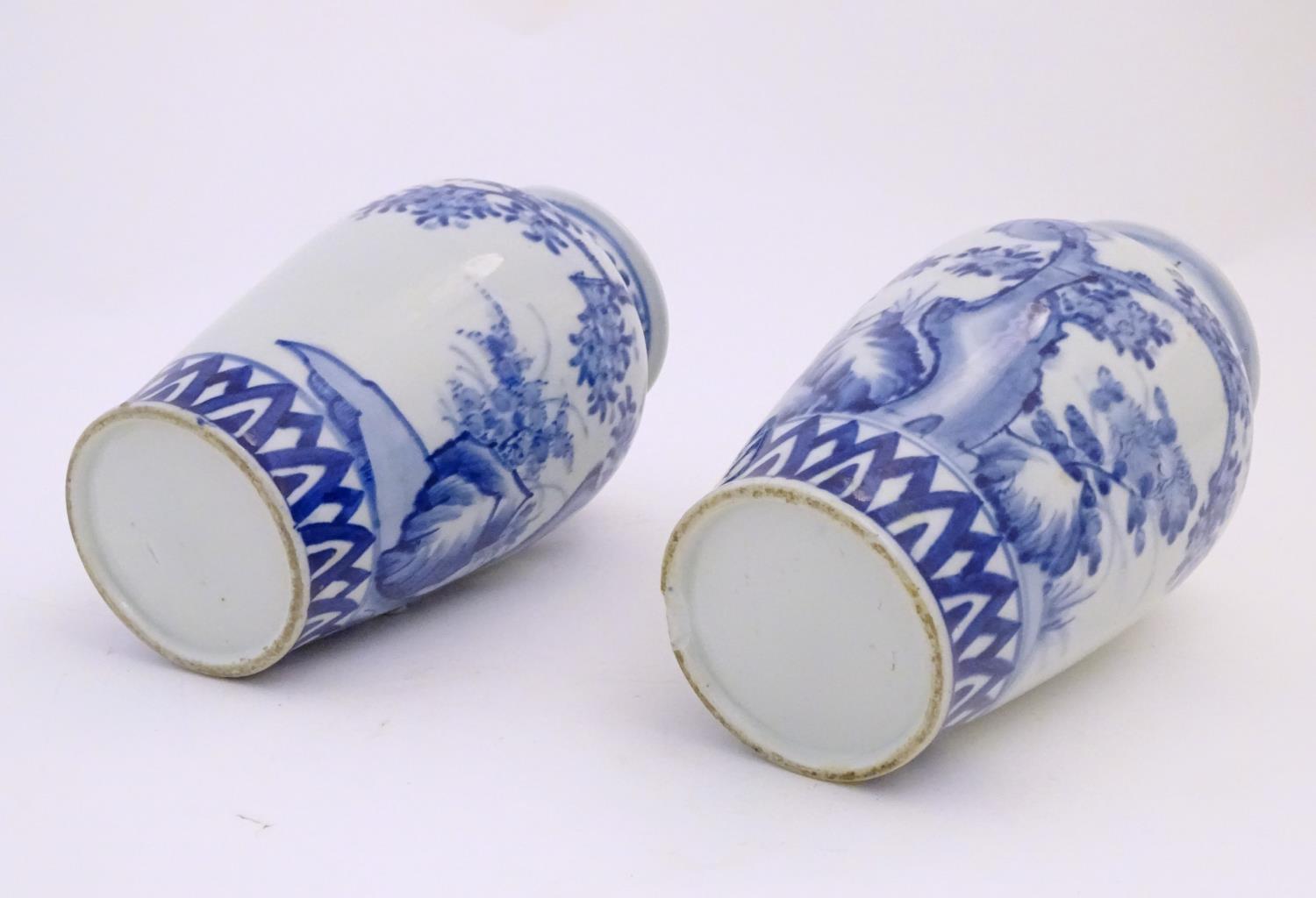 Two Chinese blue and white vases decorated with landscape scene with birds and trees. Approx. 9 3/4" - Image 2 of 6