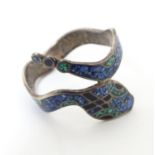 A Mexican silver ring formed as a snake with enamel decoration . Stamped inside MEXICO 925 TR-60.