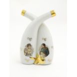 A French oil and vinegar cruet depicting portraits of Emperor Napoleon and Empress Josephine with