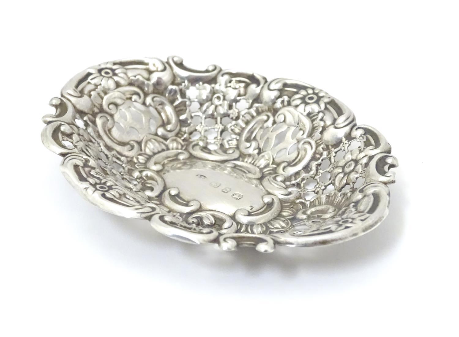 A Victorian silver bon bon dish with embossed decoration. Hallmarked Birmingham 1899, Benjamin