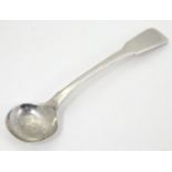 A silver fiddle pattern salt spoon, hallmarked London 1810 maker TB. 4" long Please Note - we do not