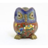 A 20thC cloisonne model of an owl with floral and foliate detail. Approx. 3" high Please Note - we