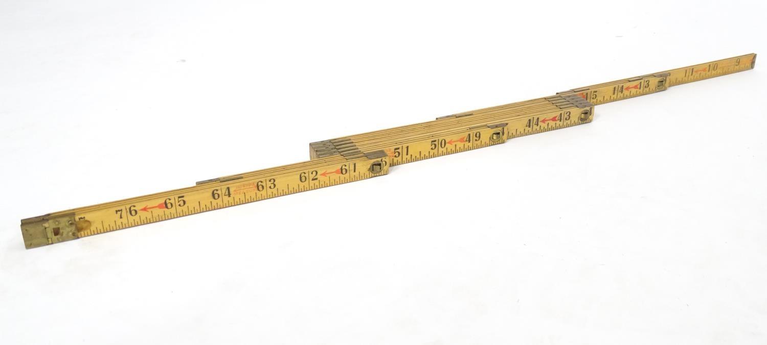 A 20thC interlocking sliding rule / ruler with locking tabs every 6 inches, mark Inside Measure to - Image 12 of 12