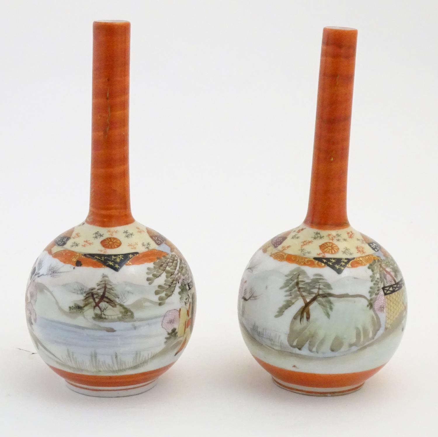 Two Japanese Kutani bottle vases decorated figures in a landscape scenes. Character marks under. - Image 5 of 7