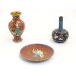 Three Oriental items of cloisonne, comprising a small baluster vase depicting a vase of flowers, a