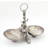 A late 19thC / early silver plate dish with twin scallop shell formed bowls united by an anchor