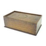 A Georgian spice box, the sliding lid opening to reveal four sections within. The lid decorated with
