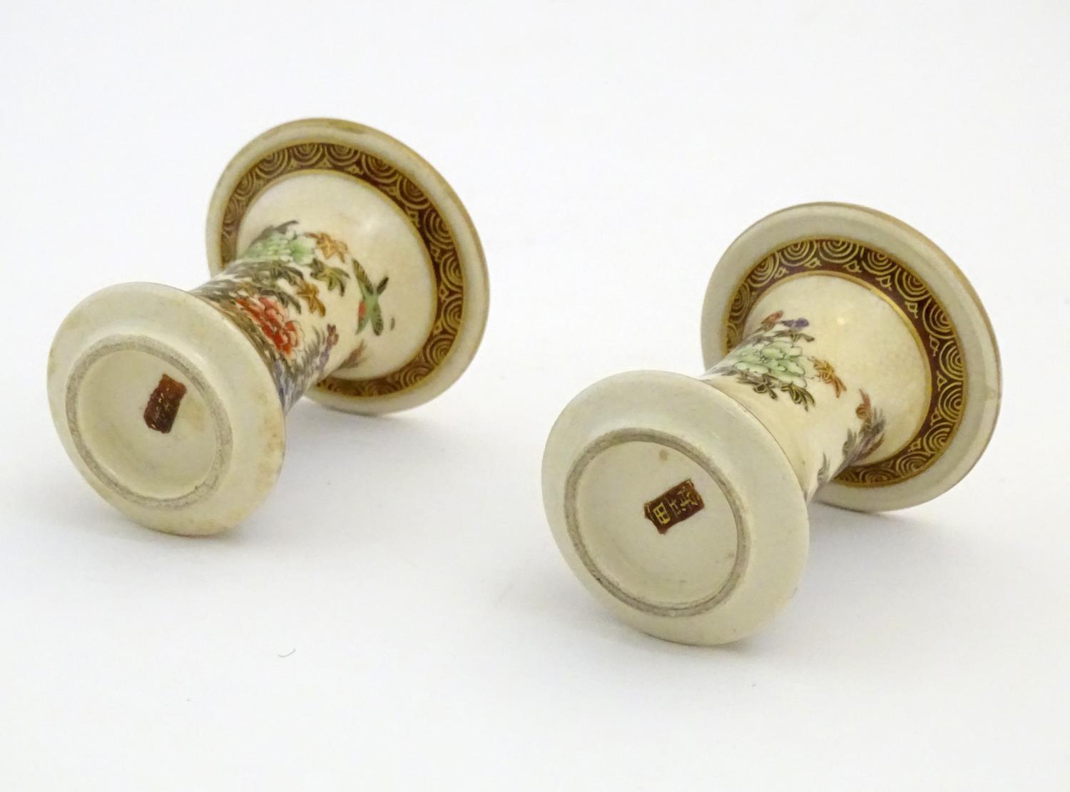 A pair of Japanese miniature Satsuma vases with flared rims and bases, decorated with flowers and - Image 6 of 8
