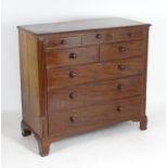 A late 18thC mahogany chest of drawers of large proportions, having a rectangular top above five