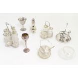 Assorted silver plated wares to include cruets, bud vase, caster, glass and silver plate preserve