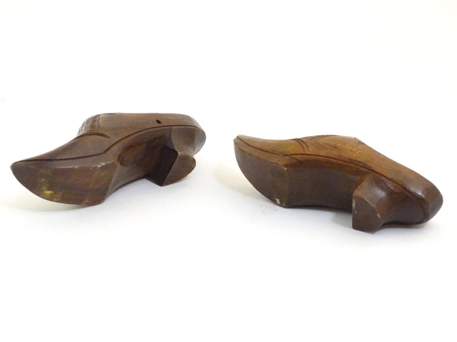 A pair of 20thC carved miniature clogs. Approx. 3 3/4" long (2) Please Note - we do not make - Image 2 of 6