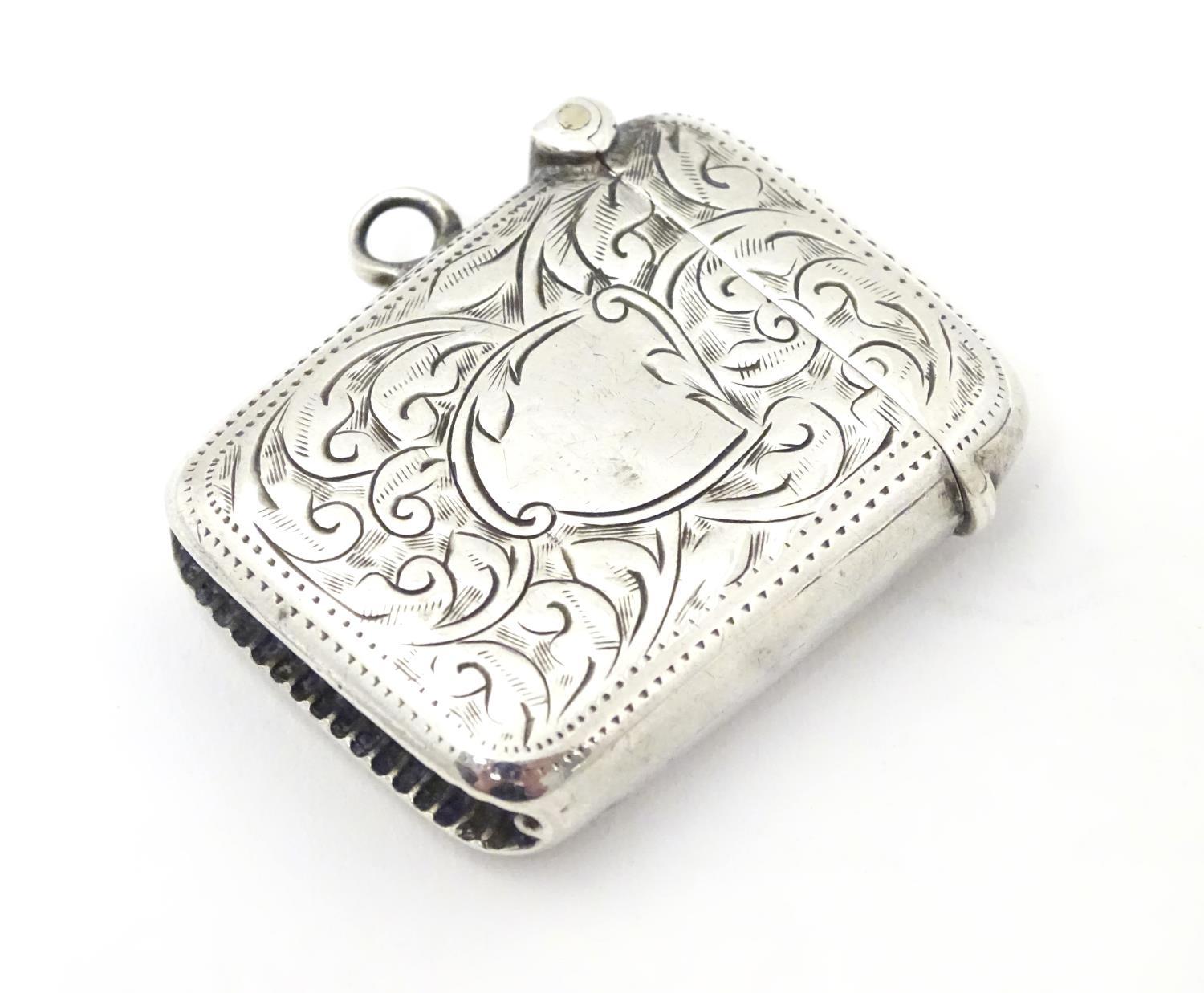 A silver vesta case with engraved decoration. Hallmarked Birmingham 1913 maker Joseph Gloster Ltd. 1 - Image 3 of 5