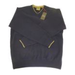 Sporting / Country pursuits: A Musto shooting V neck jumper in navy. Size XXL, new with tags,