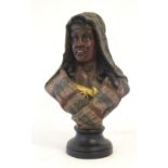 An early 20thC bust of a woman wearing a shawl with polychrome decoration, W.C. & Co. 1900 verso.