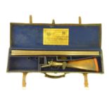 Shotgun: an Army and Navy CSL, London 12 bore sidelever back action hammergun, cased, c1880. 30