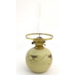 A Russell Collins, Hook Norton studio pottery oil lamp. The base approx. 7 1/2" high Please Note -