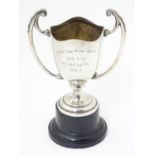 A silver twin handled trophy cup with an inscription relating to Cpl. H. Parvin of 1st Batallion The