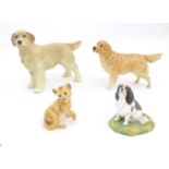 Three models of dogs comprising a Coopercraft Golden Retriever, a Royal Stratford Cavalier King