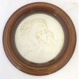 A 19thC relief plaster roundel by George Gamon Adams (1821-98) depicting Venus and Cupid Descending,