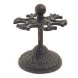 A Victorian cast iron ink stamp holder. Approx. 5 1/2" high Please Note - we do not make reference