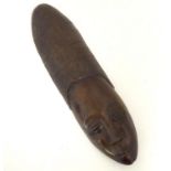 Ethnographic / Native / Tribal: A carved hardwood mask of elongated form. Approx. 19 1/2" Please