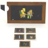 Five Victorian hand painted magic lantern slipper slides with wooden mounts. Depicting tooth
