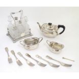 Assorted silver plated wares to include table forks, 3 piece tea set and 6 bottle cruet stand and