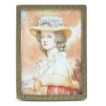 A Victorian portrait miniature depicting a young woman in a hat in a stylised landscape. Approx. 3