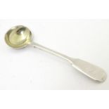 A George IV silver fiddle pattern salt spoon with gilded bowl, hallmarked London 1827, maker Richard