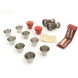 Sporting collectables: two sets of four red leather cased stacking tot cups (stamped 'Danish'