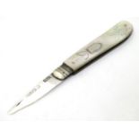 A silver fruit knife with mother of pearl handle. Hallmarked Sheffield 1859 maker Brown & Clark .