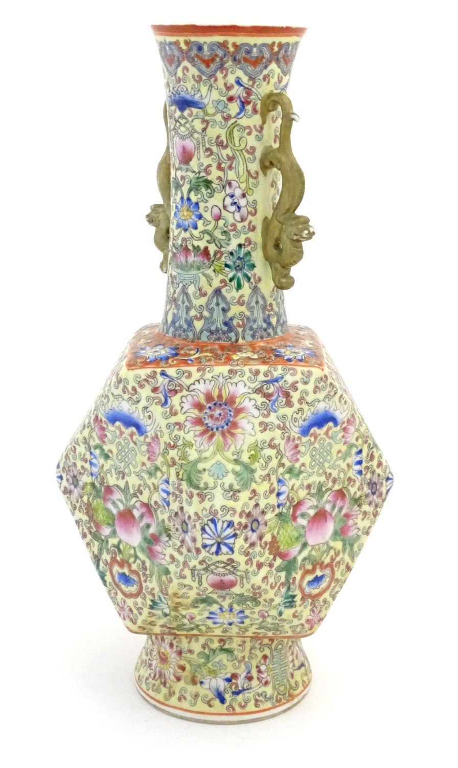 A Chinese famille jaune vase with twin handles modelled as stylised dragons, the body decorated with - Image 4 of 7