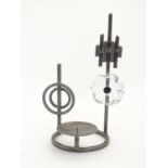 A 20thC Scandinavian / Swedish Bo Strom candle holder with wrought iron and glass detail. Signed