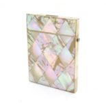 A Victorian mother of pearl card case of rectangular form with a hinged lid and push button release.