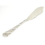 A Victorian silver butter knife, hallmarked London 1895 7" long Please Note - we do not make
