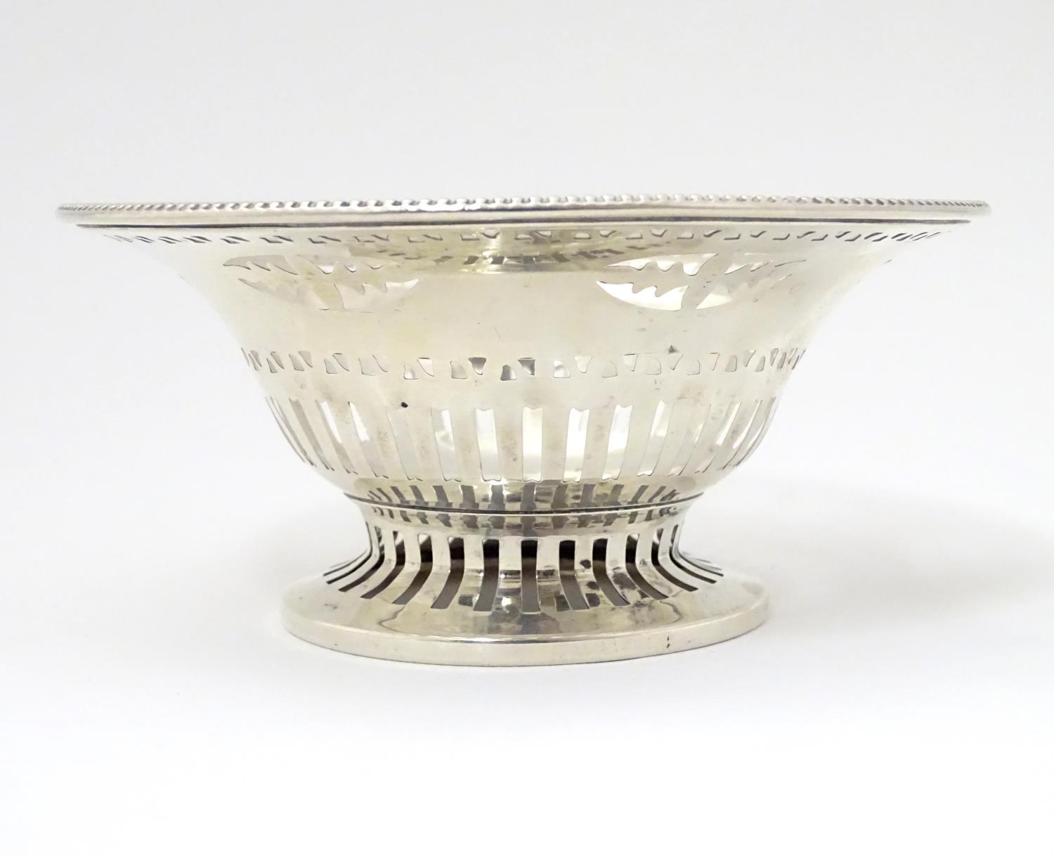 A silver bonbon dish with beaded edge and pierced decoration raised on circular foot. Hallmarked - Image 6 of 6