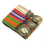 Militaria: a miniature campaign medal group, comprising WWII/WW2/Second World War Defence and War