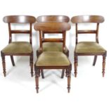 A set of four late 19thC mahogany dining chairs with curved top and mid rails above drop in seats