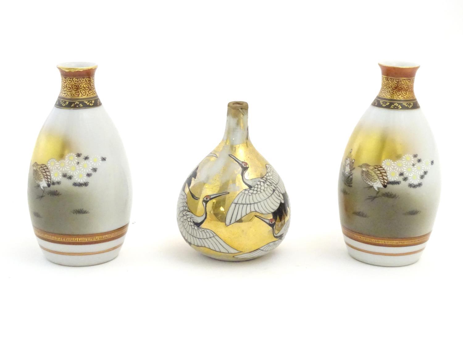 Three Japanese vases, comprising a pair decorated with a landscape scene with quail birds and - Image 4 of 11