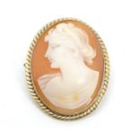 A shell carved cameo brooch depicting the bust of a classical lady 1 1/2" Please Note - we do not
