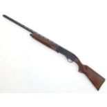 Shotgun: a Winchester 1400 12 bore semi automatic shotgun, 28 barrel with 2 3/4 chamber, wide