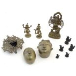 A quantity of assorted cast Eastern figures to include deities, masks, chickens, etc. The largest