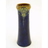 A Royal Doulton vase with stylised Art Nouveau flowers in relief. Royal Doulton stamp and maker's